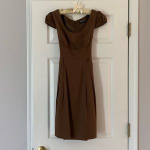 BCBG Brown dress it up or dress it down. Worn 2 times. Satin lined.